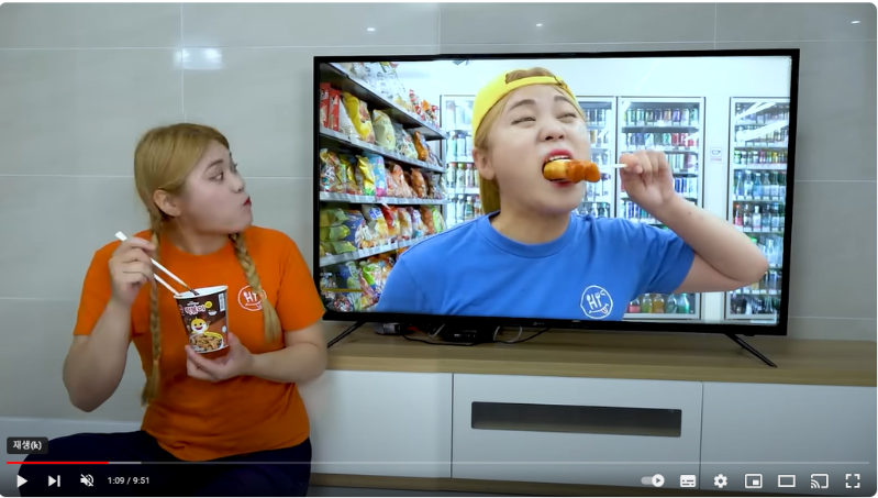 HIU is stealing HIU's food on TV.