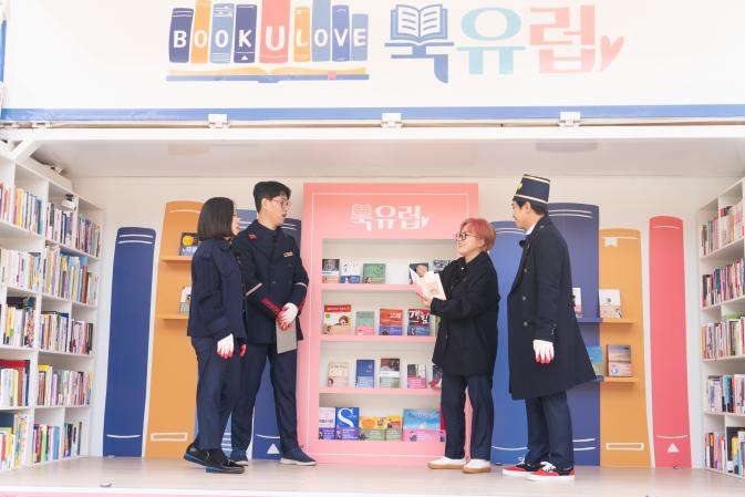 'Book Truck' delivers donated books to set up "My Local Library" in a marginalized area.